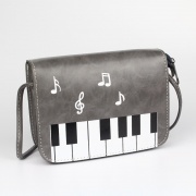 Dámská kabelka přes rameno s klaviaturou šedá barva