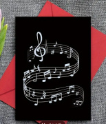 Přání bez textu letící notová osnova